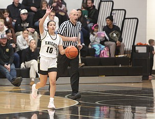 Vanesa Cedillo (10) calls out a play to her teammates as she brings the ball up court. The Knights were defeated 60-42 by Zillah Friday.