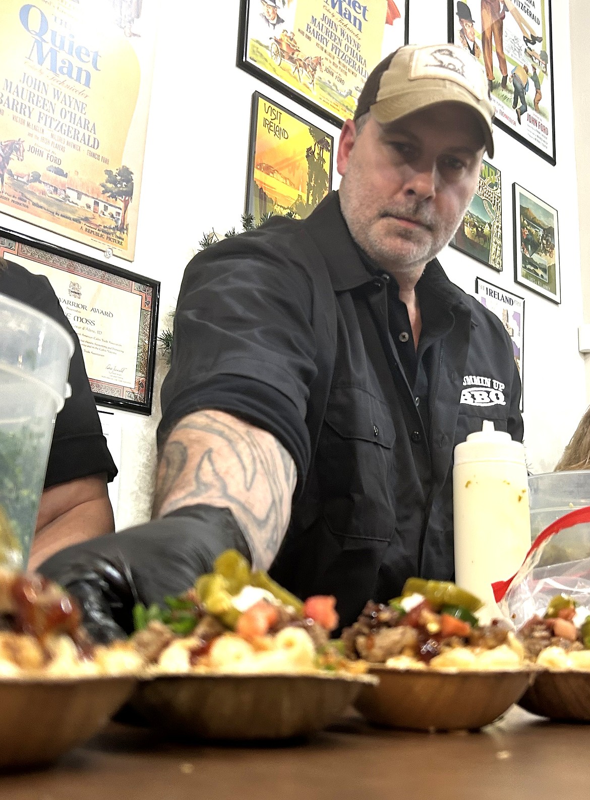 Nick Burns with Drummin Up BBQ Catering sets out a Mac ‘n Cheese Brisket Bowl at All Things Irish during the Mac & Cheese Festival on Saturday.