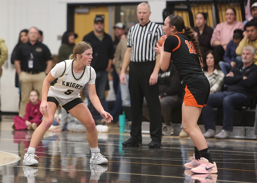 The Knights’ Maggie Frank (5) guards a Zillah player closely. The Knights fell to Zillah 42-60 in a competitive game Friday.