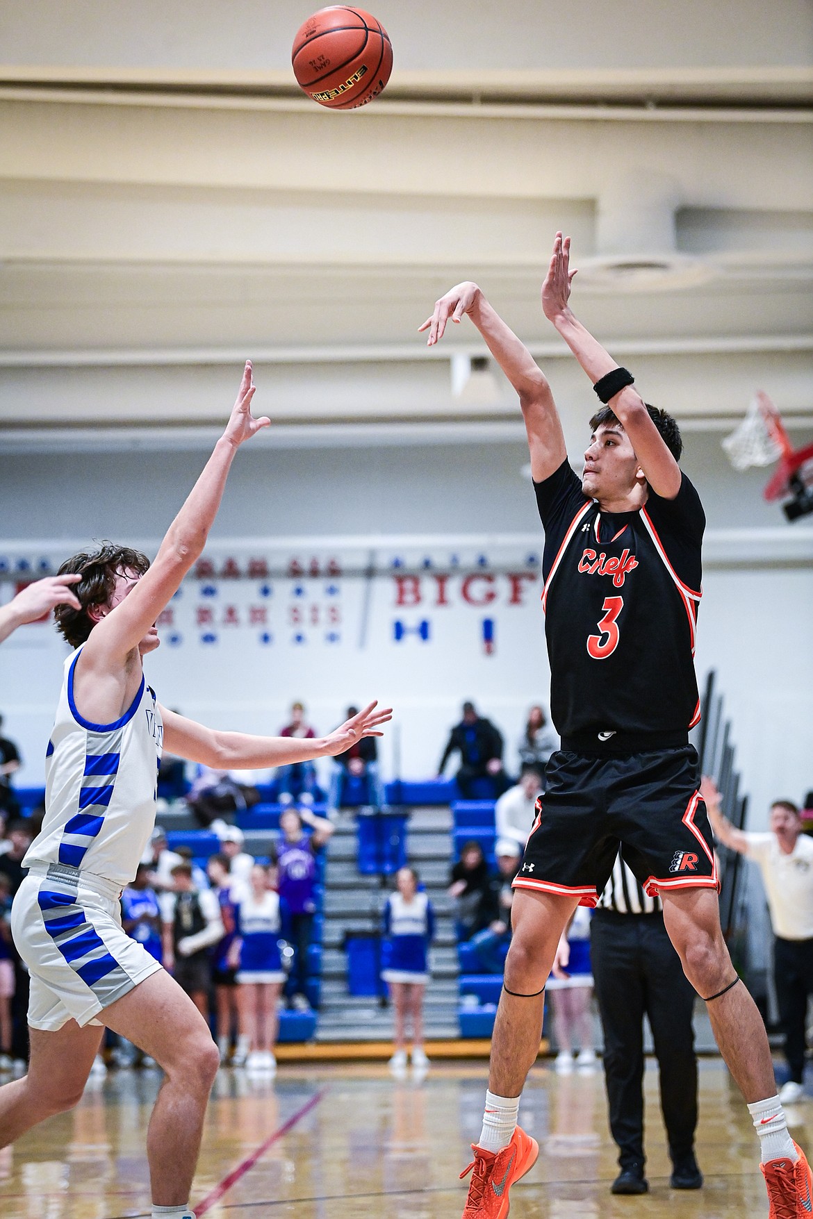 Ronan's Jhett McDonald (3) knocks down a three in the second half against Bigfork at Bigfork High School on Tuesday, Jan. 20. (Casey Kreider/Daily Inter Lake)