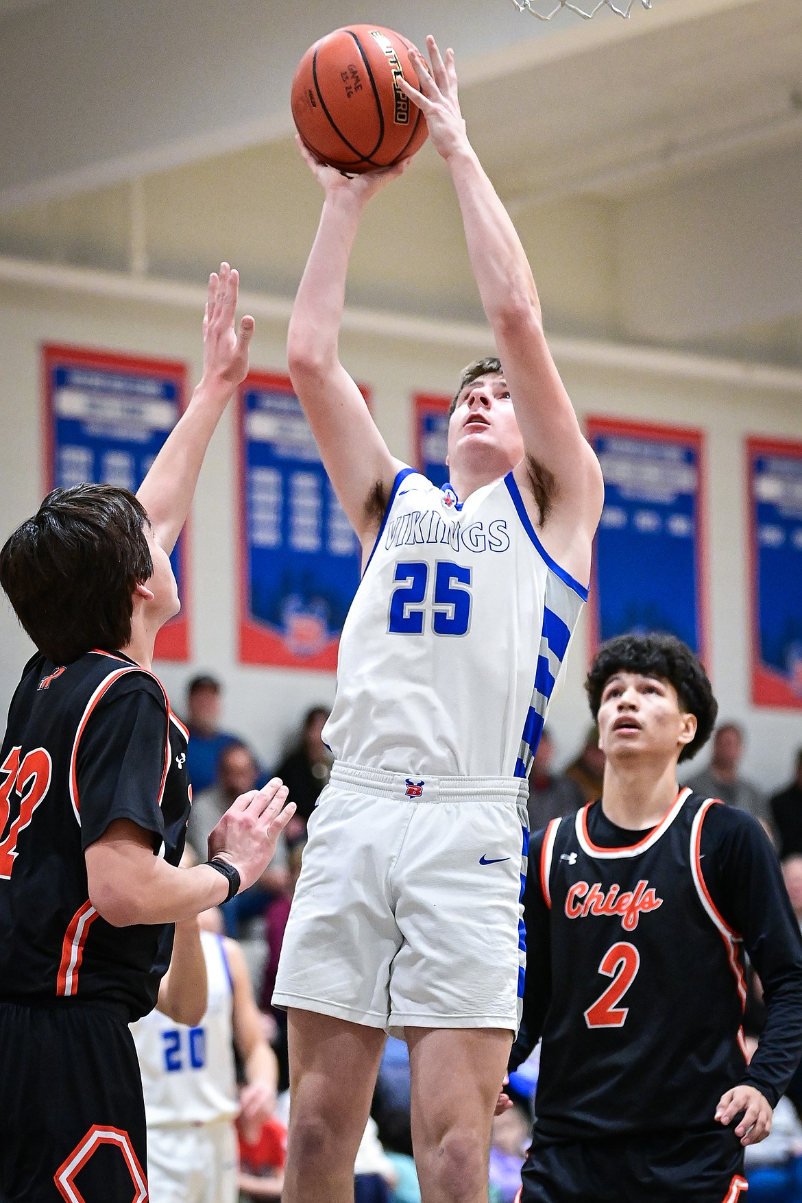 Bigfork's Justin Gates (25) goes to the basket in the first half against Ronan at Bigfork High School on Tuesday, Jan. 20. (Casey Kreider/Daily Inter Lake)