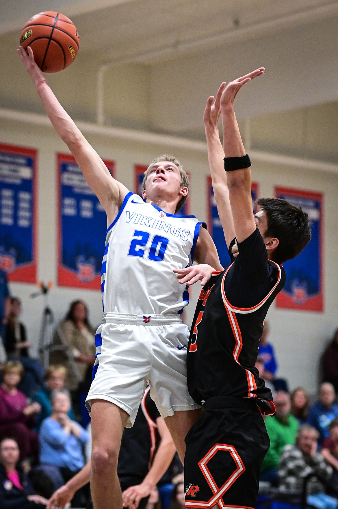 Bigfork's Alex Ochs (20) drives to the basket in the first half against Ronan at Bigfork High School on Tuesday, Jan. 20. (Casey Kreider/Daily Inter Lake)