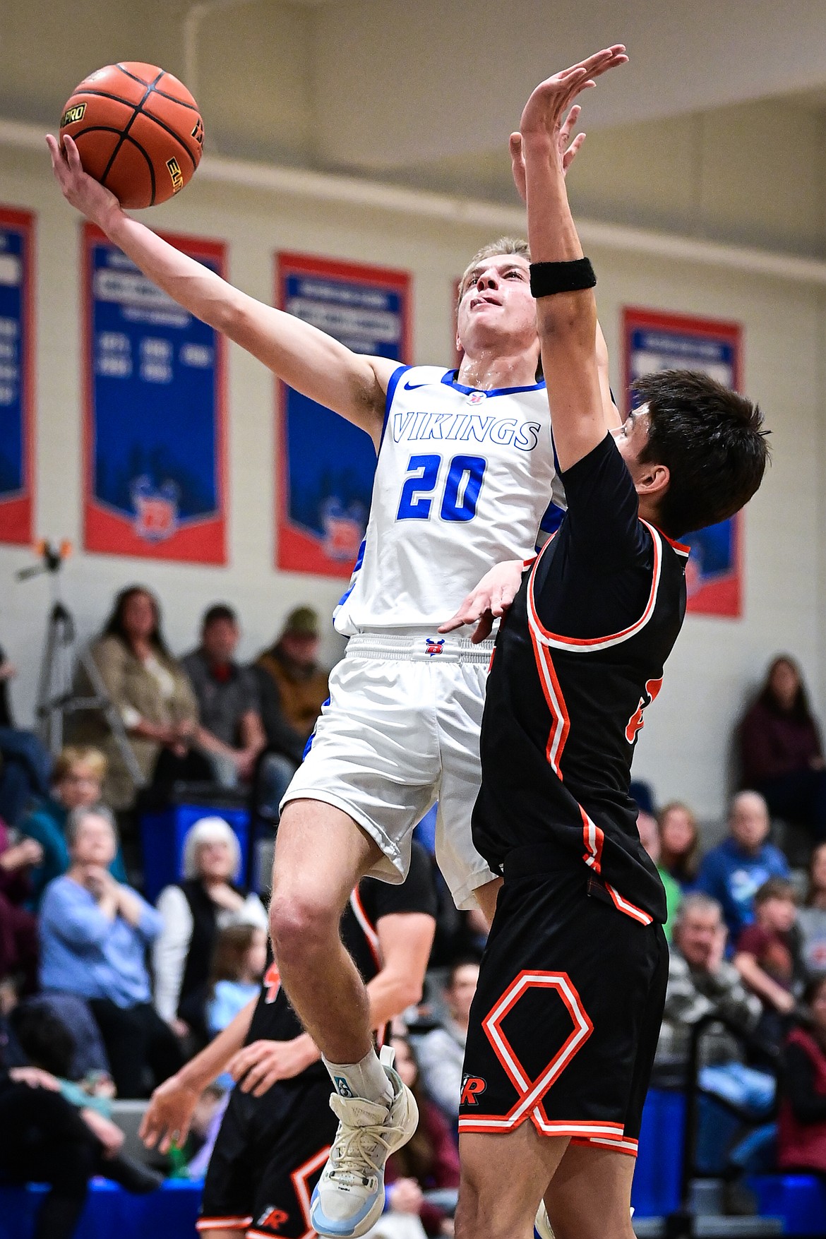 Bigfork's Alex Ochs (20) drives to the basket in the first half against Ronan at Bigfork High School on Tuesday, Jan. 20. (Casey Kreider/Daily Inter Lake)