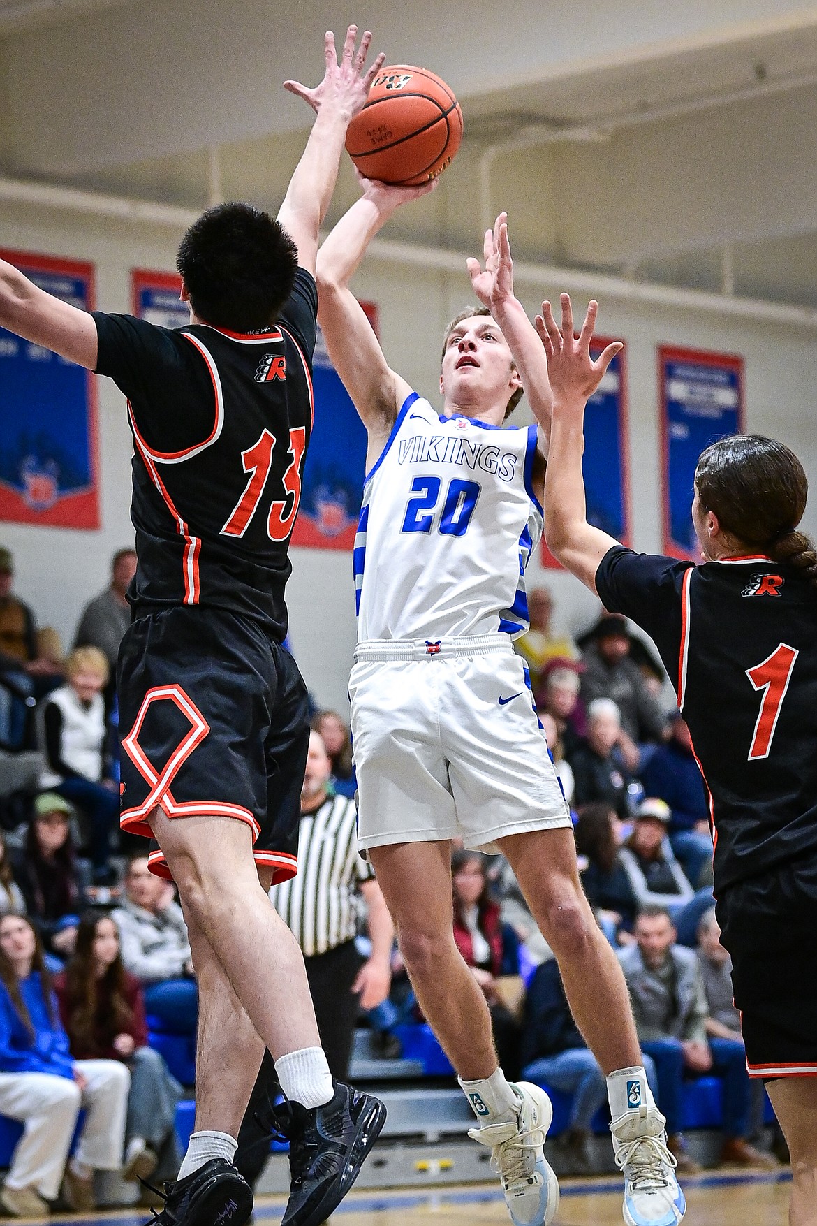Bigfork's Alex Ochs (20) drives into the lane for a shot in the first half against Ronan at Bigfork High School on Tuesday, Jan. 20. (Casey Kreider/Daily Inter Lake)