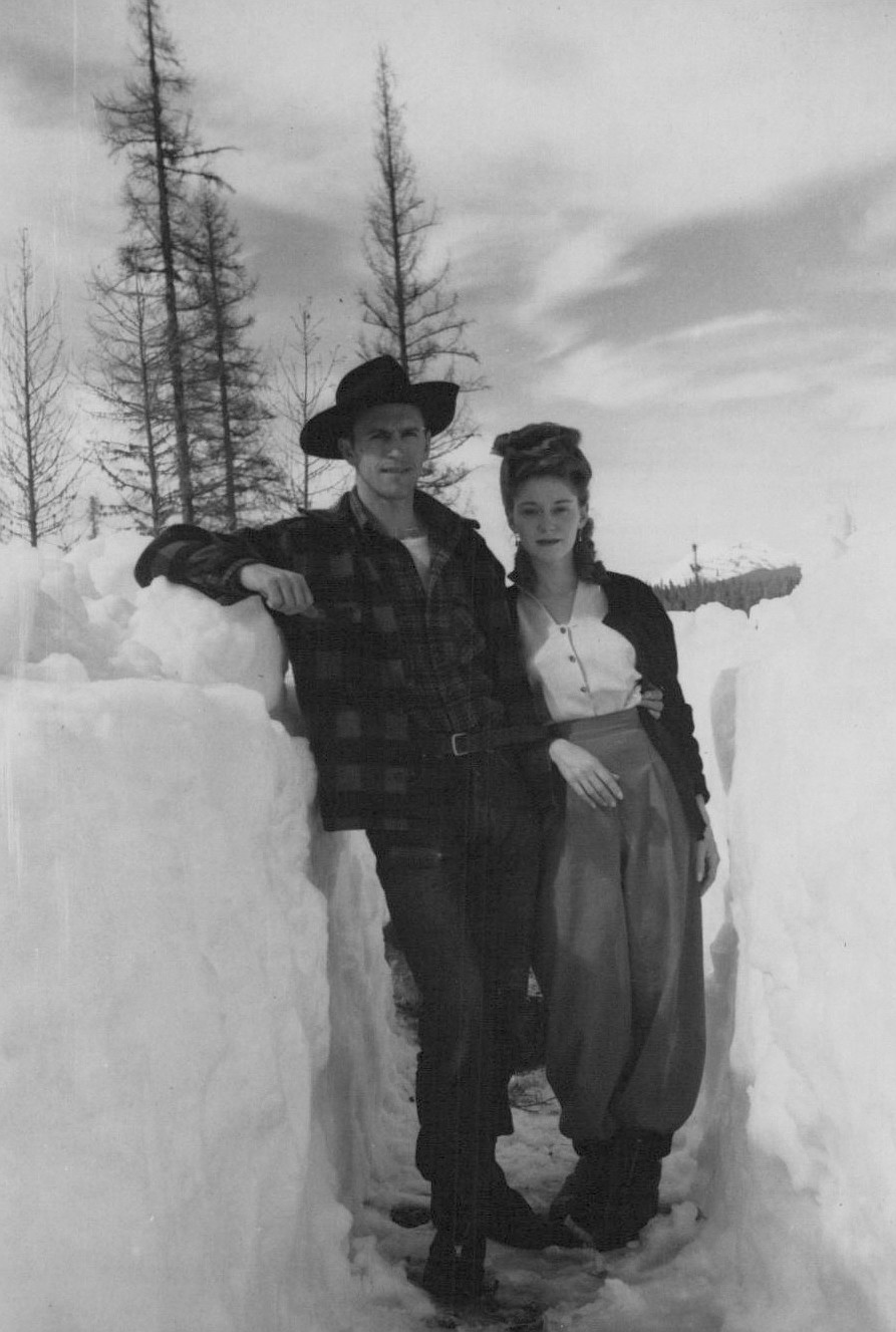 Dan and Gerane Block pose next to a winter snowbank outside their home on the North Fork of the Flathead River. (Courtesy of Zach Block)