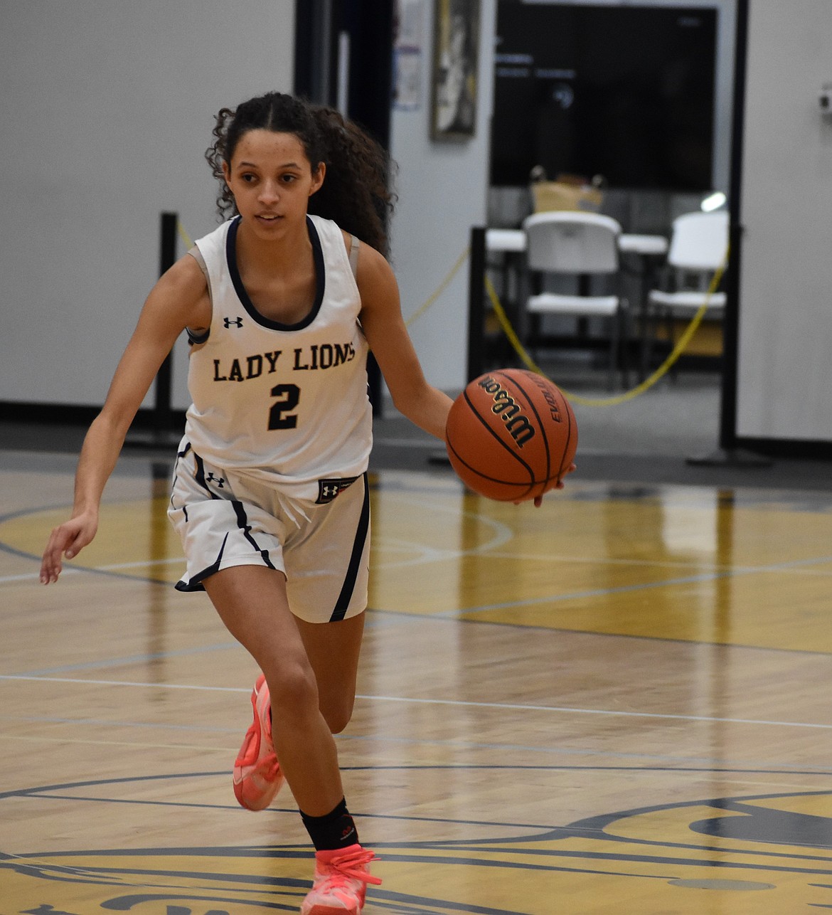 MLCA/CCS senior SanTahna Ferguson moves down the court with possession of the ball during Tuesday’s home game. Ferguson led the team offensively with 12 points against La Salle.