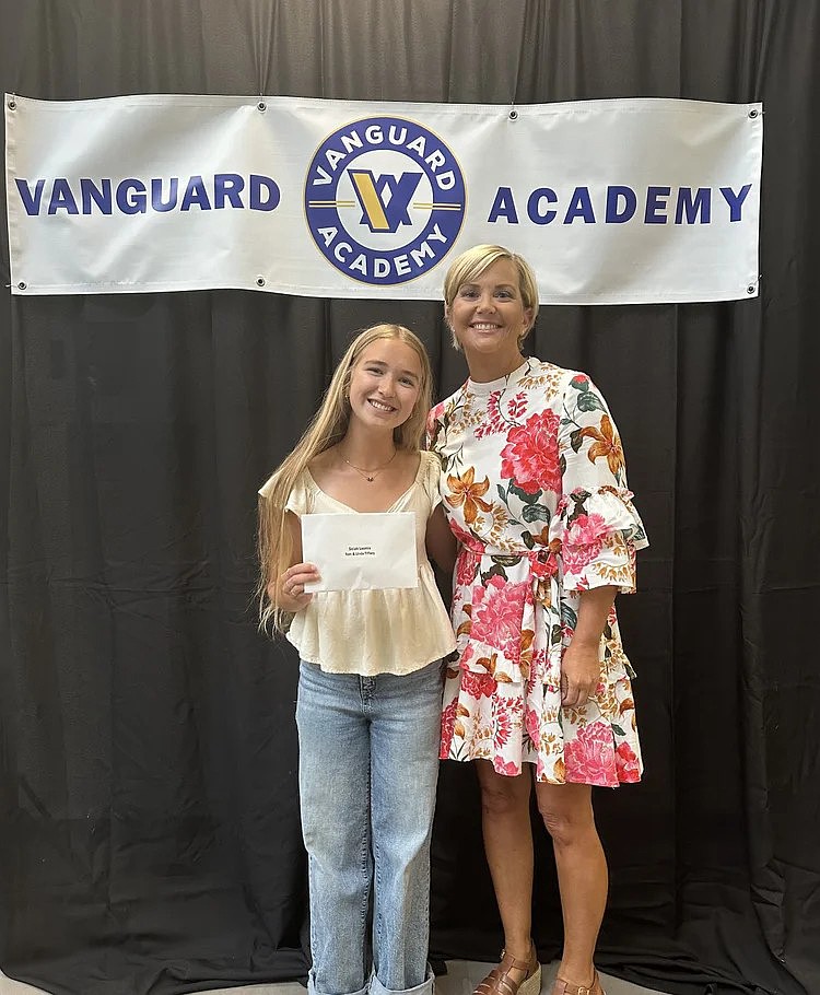 Selah Loomis, left, of Vanguard Academy receives the Tom and Linda Tiffany Scholarship. That award is open to graduates of the Moses Lake School District, preferably low-income, who are majoring in education.