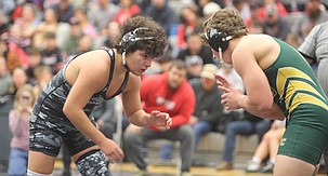 Gabriel Mungia, left, sparring with an opponent he faced in the Banks Lake Brawl earlier this season. Mungia earned a pinfall victory in the Broncos 53-24 loss to Colfax Wednesday.