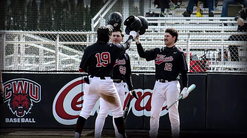 Max Bledy (12), Brandham Ponce (19) and Logan Blank (28) celebrate during their game against Montana State Billings last season. The Wildcats host their first home game of the season against MSU on Feb. 27.