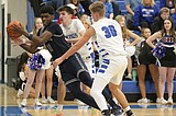 PREP BOYS BASKETBALL: Lake City's Plummer shines ... Lefty sinks five 3-pointers, scores 17 as Timberwolves fend off Coeur d'Alene