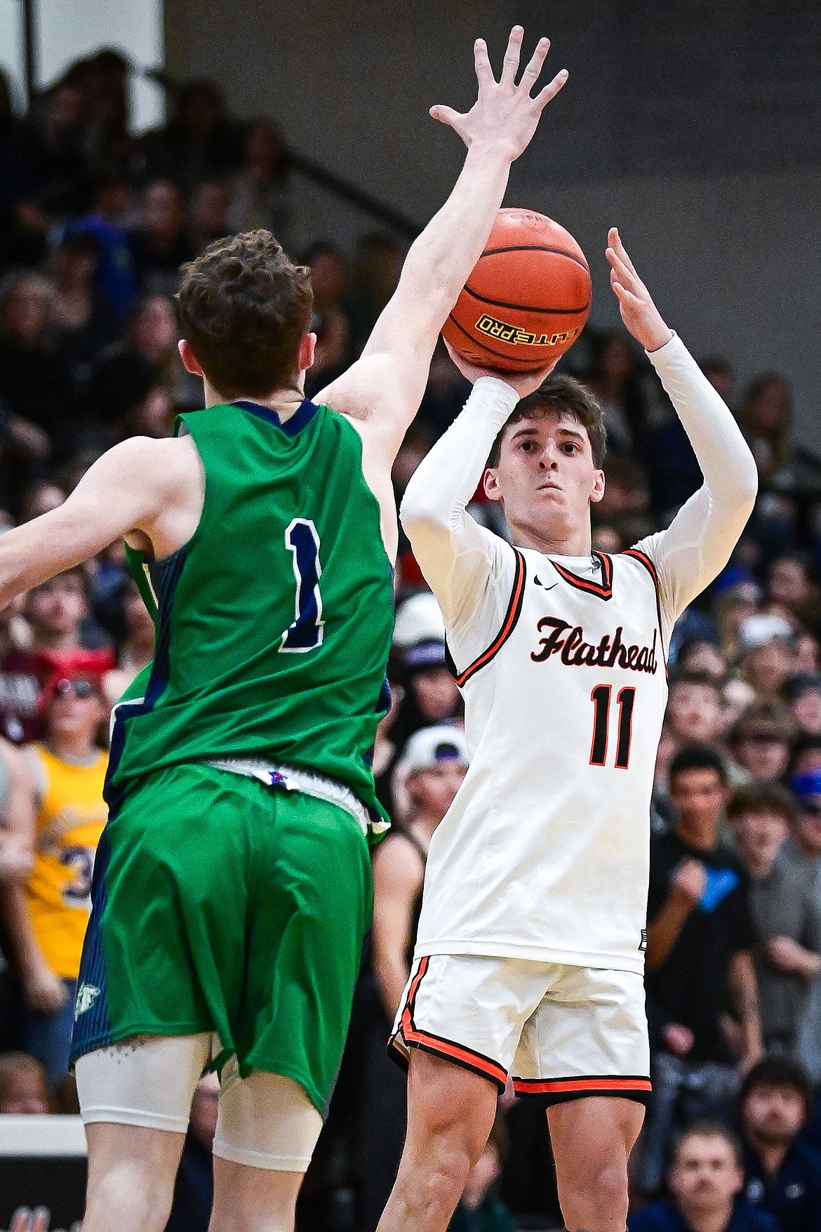 Flathead's Ben Reichner (11) shoots in the second half against Glacier at Flathead High School on Friday, Jan. 23. (Casey Kreider/Daily Inter Lake)