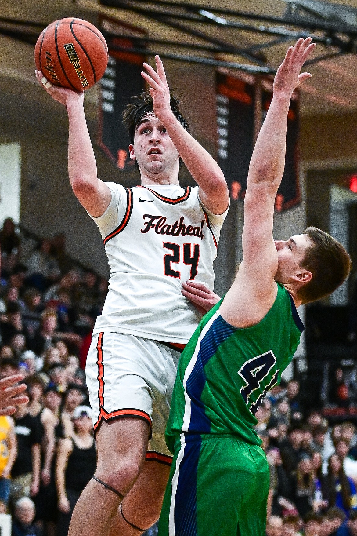 Flathead's Boston Case (24) drives into the lane for a shot against Glacier in the second half at Flathead High School on Friday, Jan. 23. (Casey Kreider/Daily Inter Lake)