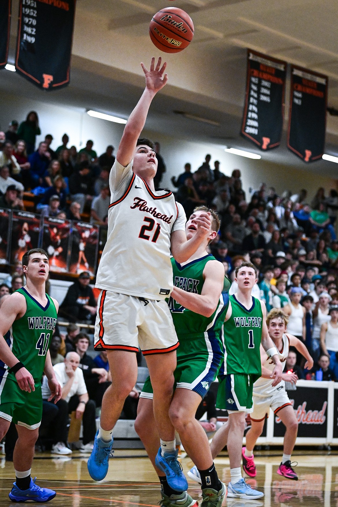 Flathead's Liam Rech (21) shoots in the second half against Glacier at Flathead High School on Friday, Jan. 23. (Casey Kreider/Daily Inter Lake)