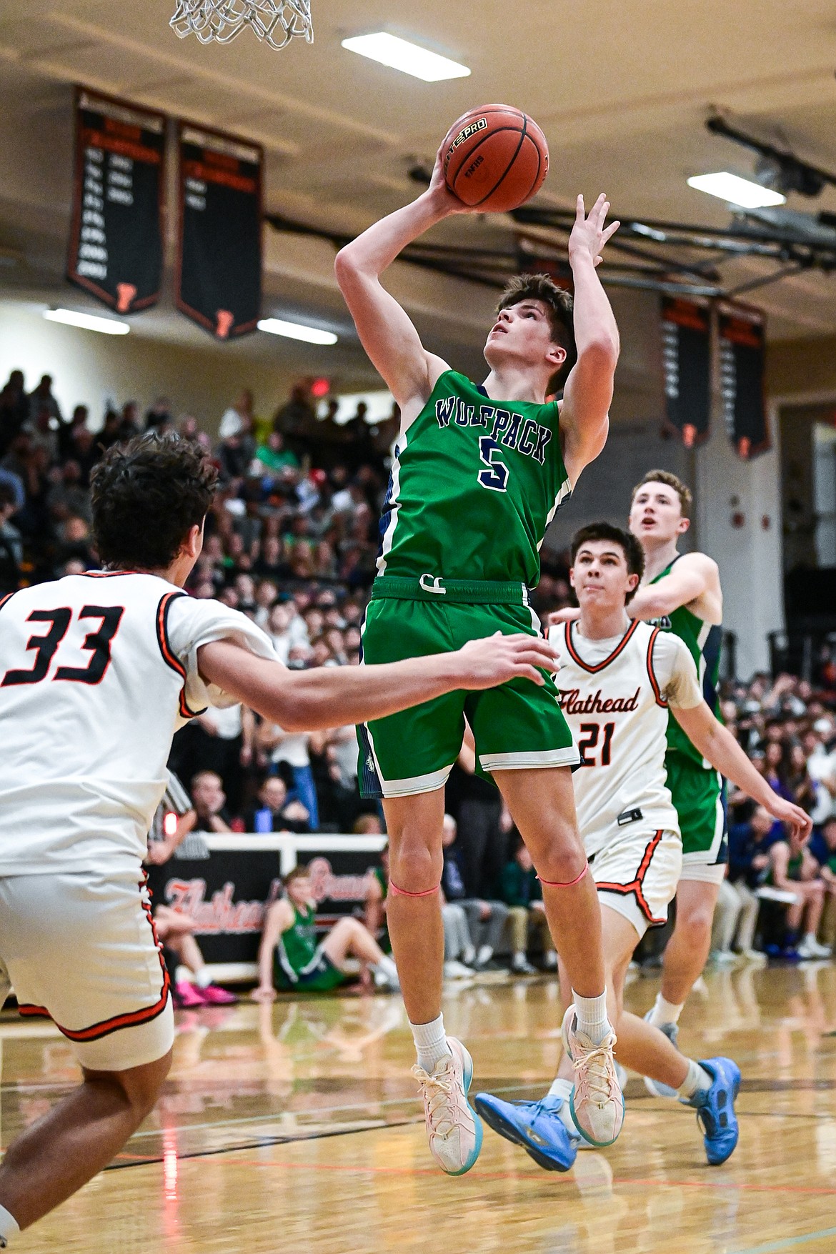 Glacier's Hudson Kastelitz (5) shoots in the paint in the first half against Flathead at Flathead High School on Friday, Jan. 23. (Casey Kreider/Daily Inter Lake)