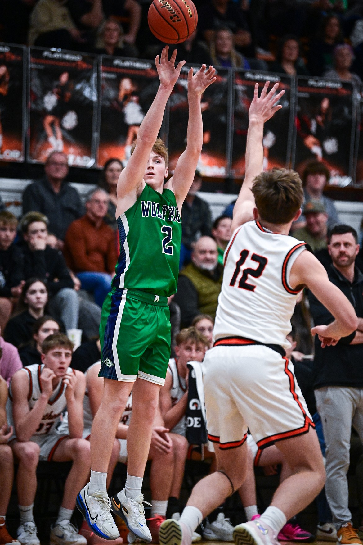 Glacier's Ethan Kastelitz (2) shoots a three in the first half against Flathead at Flathead High School on Friday, Jan. 23. (Casey Kreider/Daily Inter Lake)