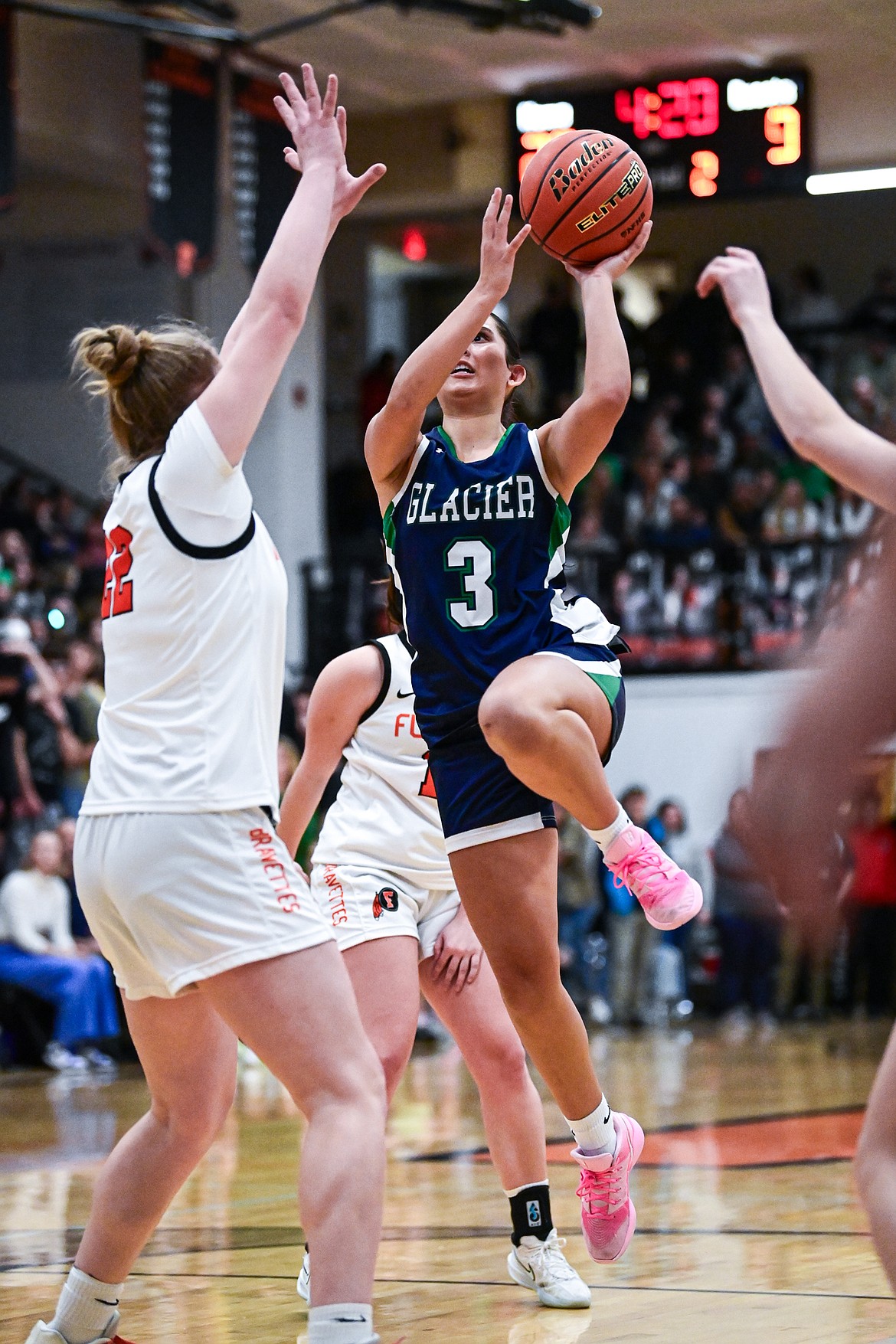 Glacier's Nika Wangerin (3) drives into the lane for a shot in the first half against Flathead at Flathead High School on Friday, Jan. 23. (Casey Kreider/Daily Inter Lake)