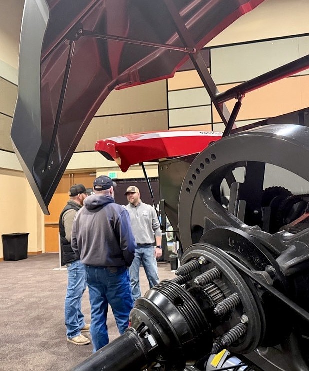 Attendees of the Northwest Hay Expo speak with one another Wednesday.