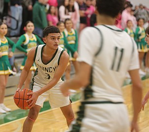 The Jacks’ Erick Zepeda (3) looks for an open teammate during their game against Ephrata. Quincy defeated the Tigers 72-39 Friday.