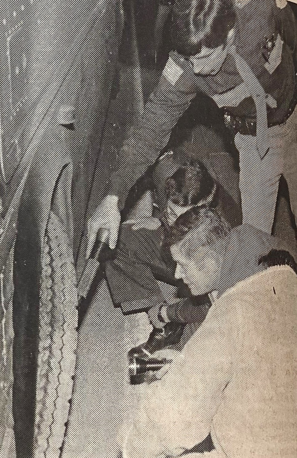 Law officers, from top, Walt Richards, Terry Turnbow and Bob Steele examine a shot-out bus tire in 1981.