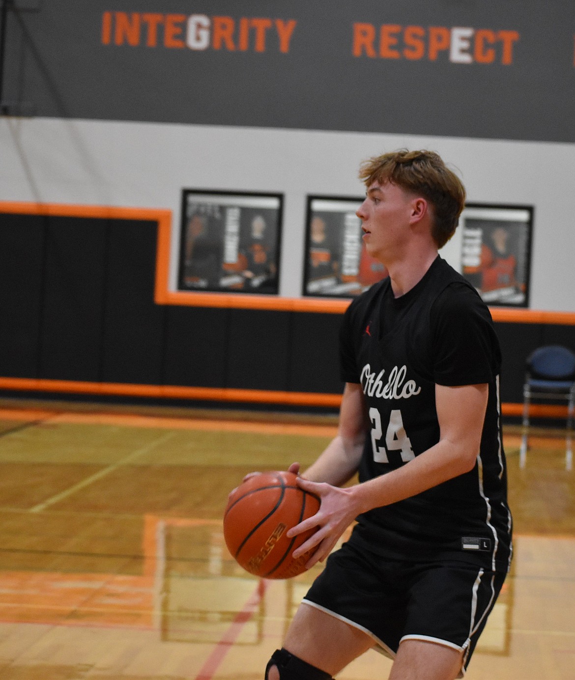 Josh Lawson, a senior from the Huskies, looks for an opening during the game against Ephrata Tuesday evening.