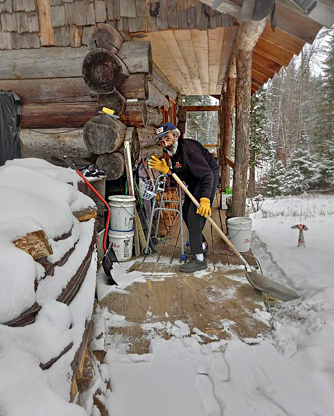Gary Cabell shovels show at his home last week. (Photo provided)