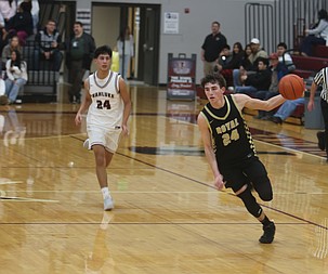 The Knights’ Grant Wardenaar (24) sprints down the court on a fastbreak against the Wahluke Warriors.