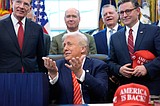 Trump signs bill to end partial government shutdown, setting stage for next fight