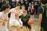 PREP BOYS BASKETBALL: Post Falls pulls away from Lakeland