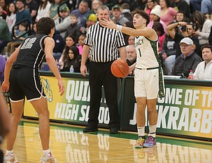 Pierce Bierlink (1) directs traffic against Ephrata earlier this season. Bierlink dropped 64 points in a 96-93 double overtime loss to Toppenish Tuesday.