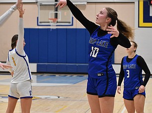 Eagles freshman Marina Zubritskiy takes a shot at the hoop during Thursday’s matchup against the Devils.
