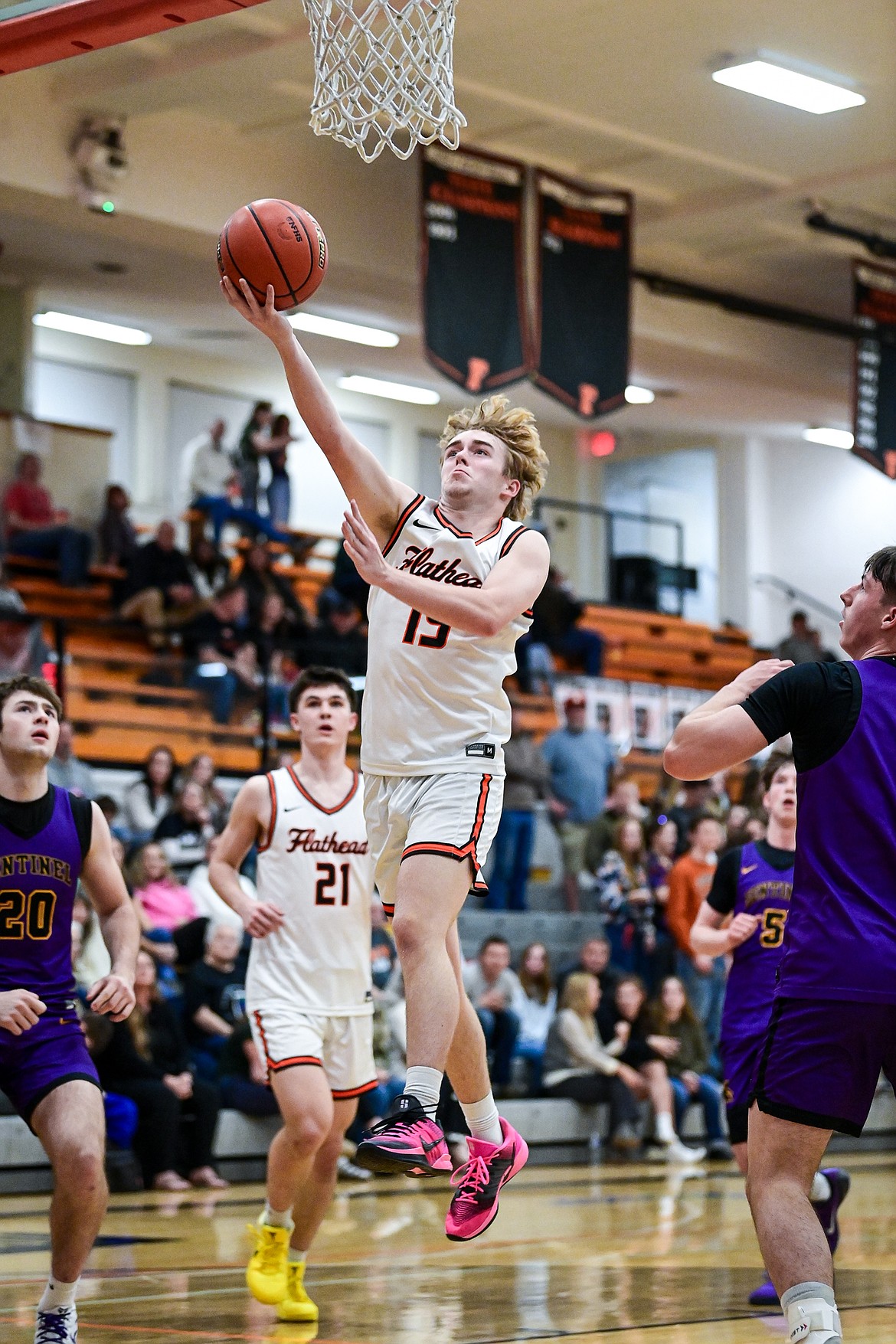 Flathead's Hunter Fann (15) drives to the basket in the first half against Missoula Sentinel at Flathead High School on Tuesday, Feb. 10. (Casey Kreider/Daily Inter Lake)