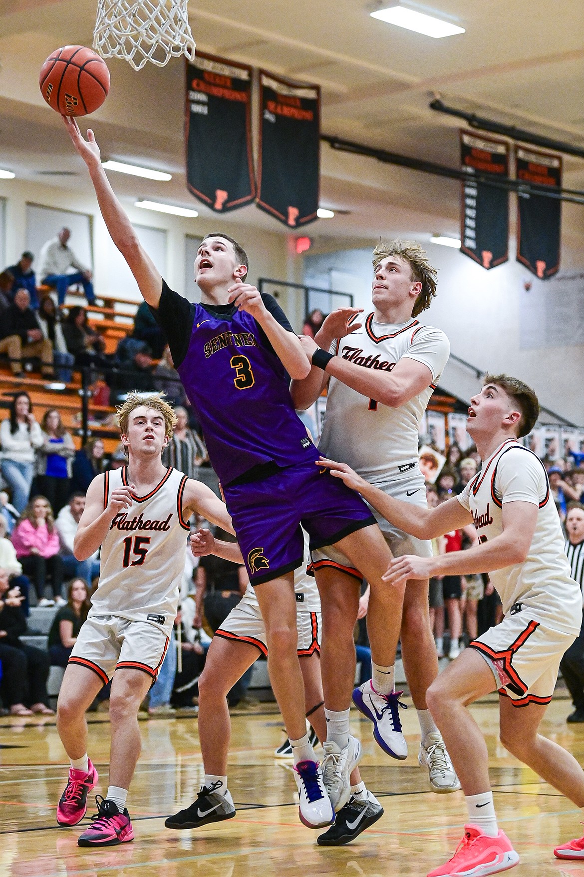 Missoula Sentinel's Lincoln Rogers (3) goes to the basket in the third quarter against Flathead at Flathead High School on Tuesday, Feb. 10. (Casey Kreider/Daily Inter Lake)