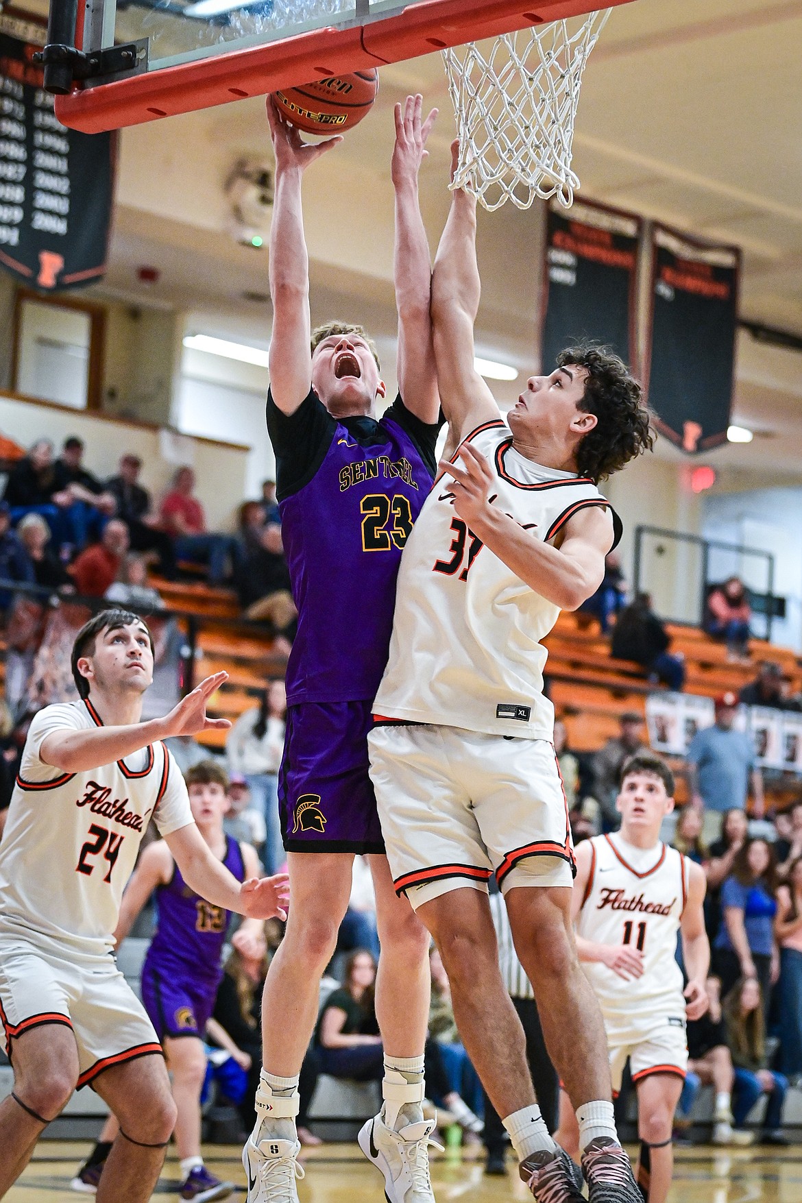 Missoula Sentinel's Jayson McLennan (23) goes to the basket in the third quarter against Flathead at Flathead High School on Tuesday, Feb. 10. (Casey Kreider/Daily Inter Lake)