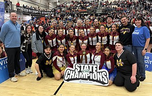 The Moses Lake Mavericks competitive cheer team gathers for a team photo after becoming state champions. They finished first in the 3A/4A game day coed group and second in the 3A/4A tumbling coed group.