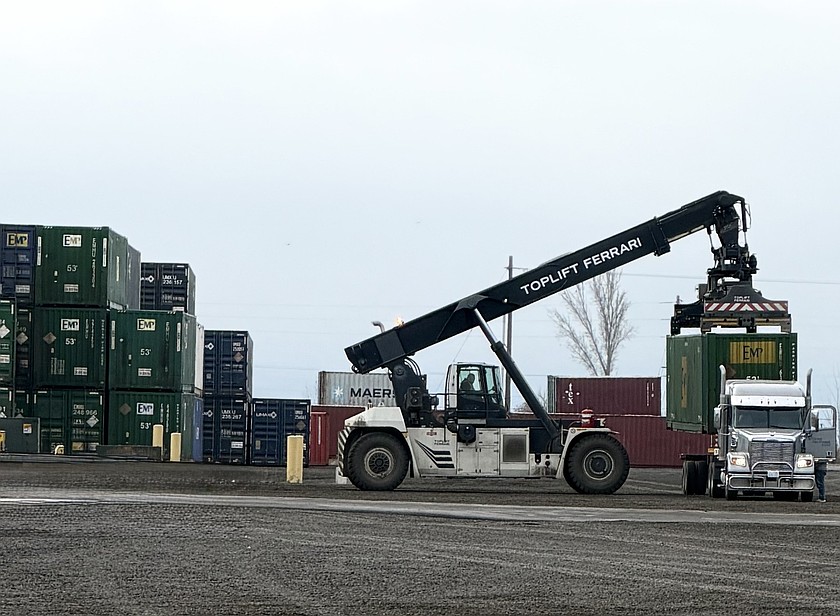 A container is loaded on a truck at Tri-Cities Intermodal near Kennewick. An intermodal port offers multiple types of transport, which may include river barges, 18-wheelers, aircraft and trains.