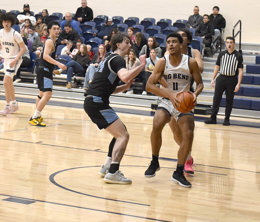 The Vikings’ Jakari Singleton (11) drives into the paint against Columbia Basin College. Big Bend Community College defeated the Hawks 85-63 Wednesday.