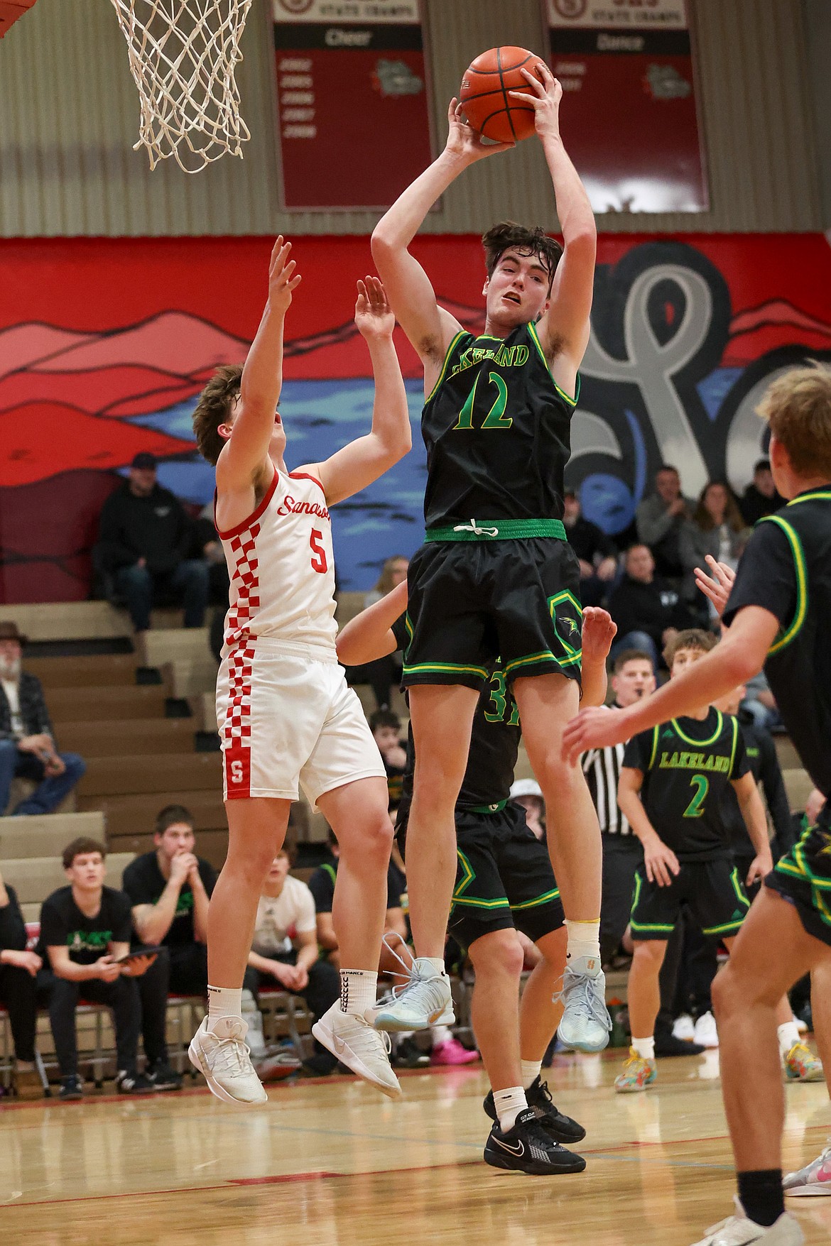 JASON DUCHOW PHOTOGRAPHY
Lakeland senior Jaron Yager (12) grabs a rebound during Friday's game at Sandpoint.