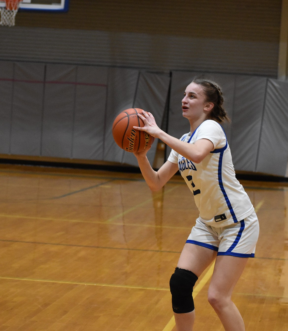 Soap Lake senior Tanya Zubritskiy aims for a three-pointer during the district matchup against Wilson Creek.