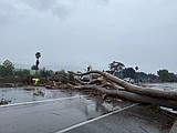 California walloped by winter storm with high winds and heavy rain and snow