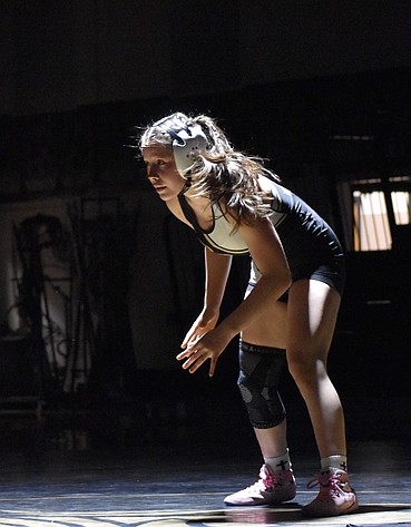 Heaven Parker from the Knights prepares to grapple her opponent during a previous home meet this season. Parker took first in the 125-lb bracket.