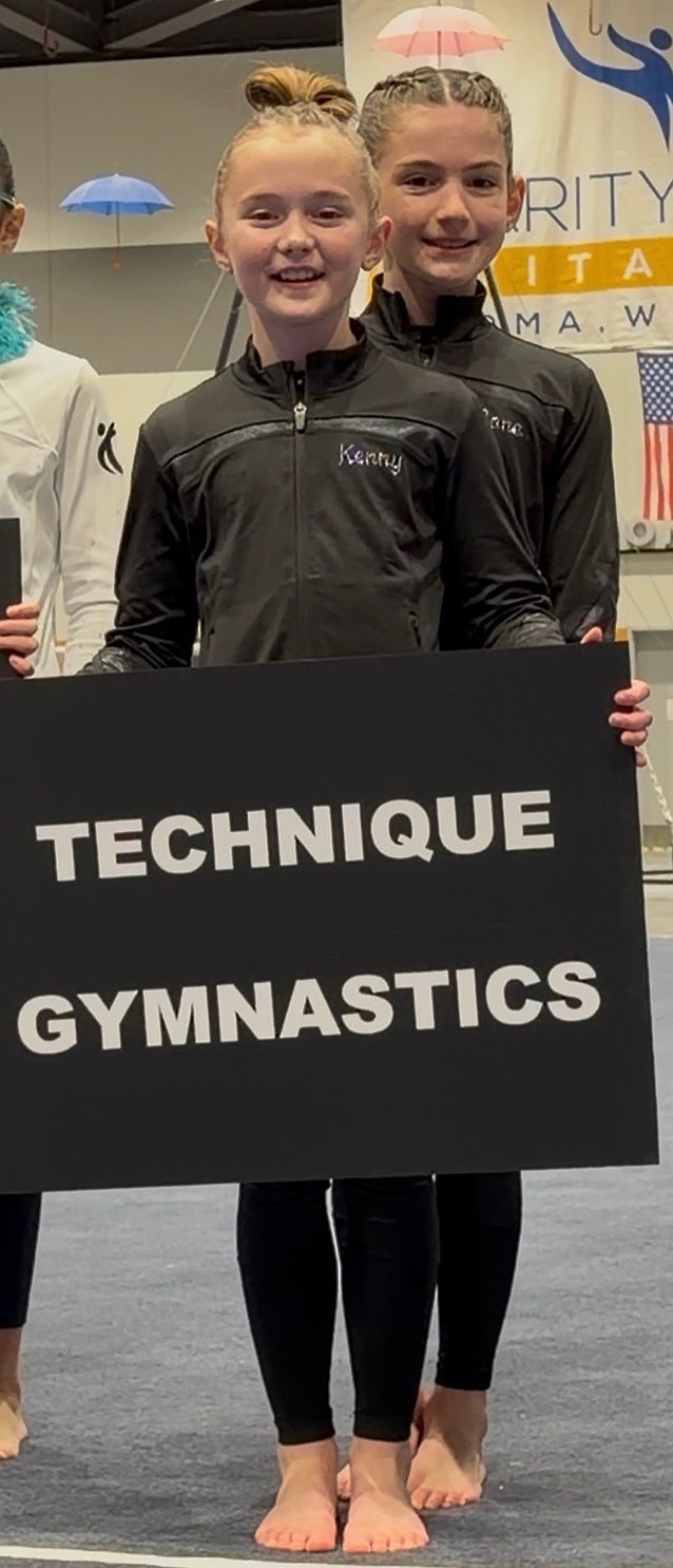 Courtesy photo
Technique Gymnastics brought its two Level 5s to The Charity Choice Invitational in Tacoma, Wash., last weekend. Mackenzie Brockett, left, was 5th on vault 9.05, 7th on beam 8.7, and 8th all-around 35.325; and Apollonia Bell was 4th on vault 9.1, 8th on bars 9.125, 5th on beam 8.8, 6th on floor 8.95, and 6th all-around 35.975.
