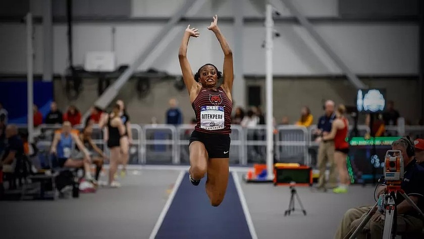 Emy Ntekpere leaps through the air during the GNAC Indoor Championships. Ntekpere brought home three gold medals following the event.
