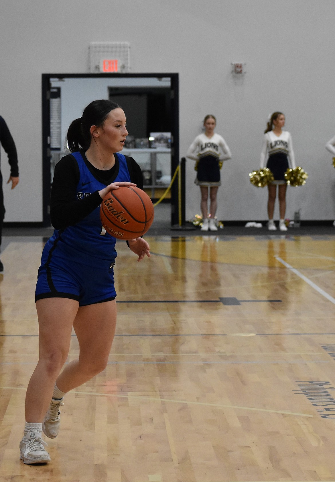 Mylee Dana, a senior from Soap Lake, makes her way from the edge of the court toward the basket looking for an opportunity to score.