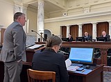 Public defender talks pending cuts