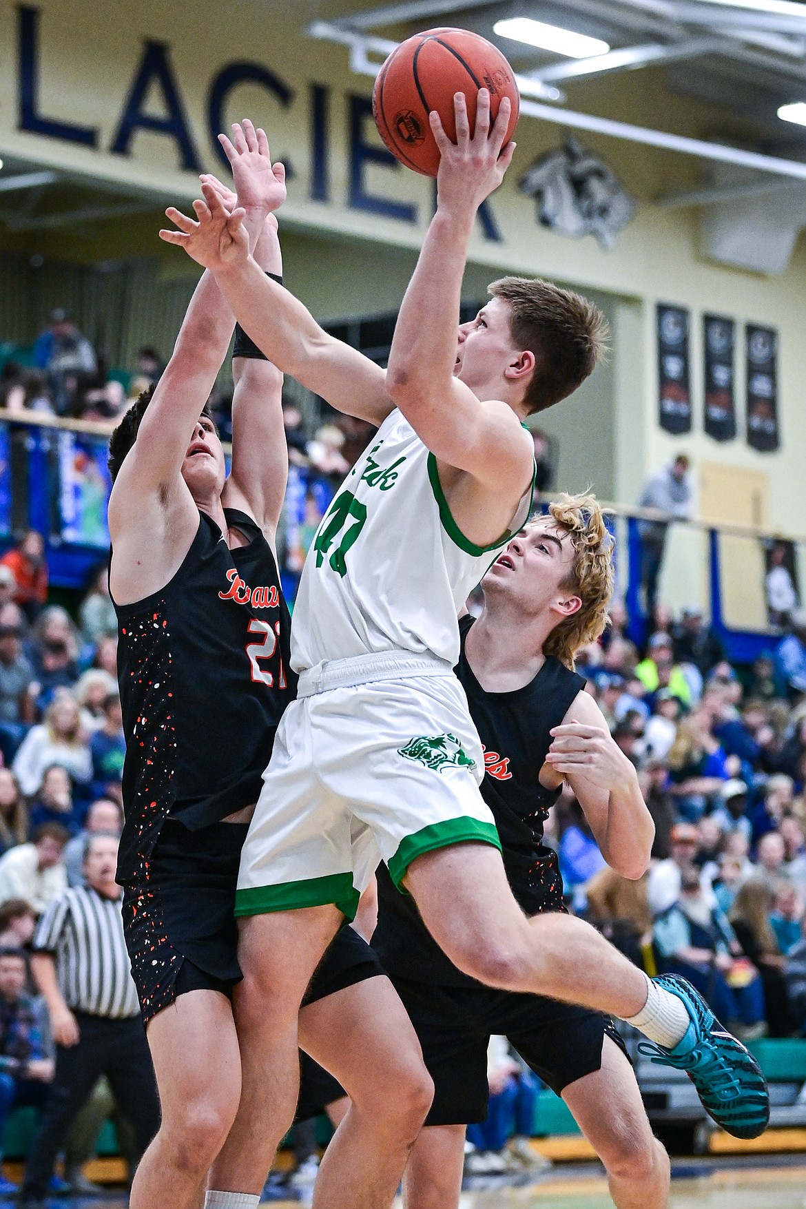 Glacier's Dylan Banzet (40) drives to the basket in the first half against Flathead at Glacier High School on Thursday, Feb. 19. (Casey Kreider/Daily Inter Lake)