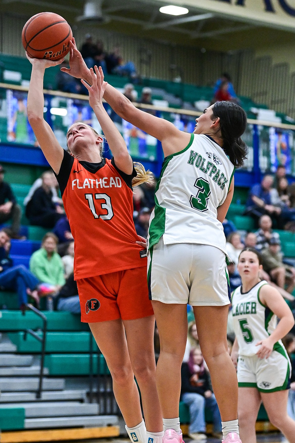 Glacier's Nika Wangerin (3) blocks a shot by Flathead's Caitlin Converse (13) in the third quarter at Glacier High School on Thursday, Feb. 19. (Casey Kreider/Daily Inter Lake)