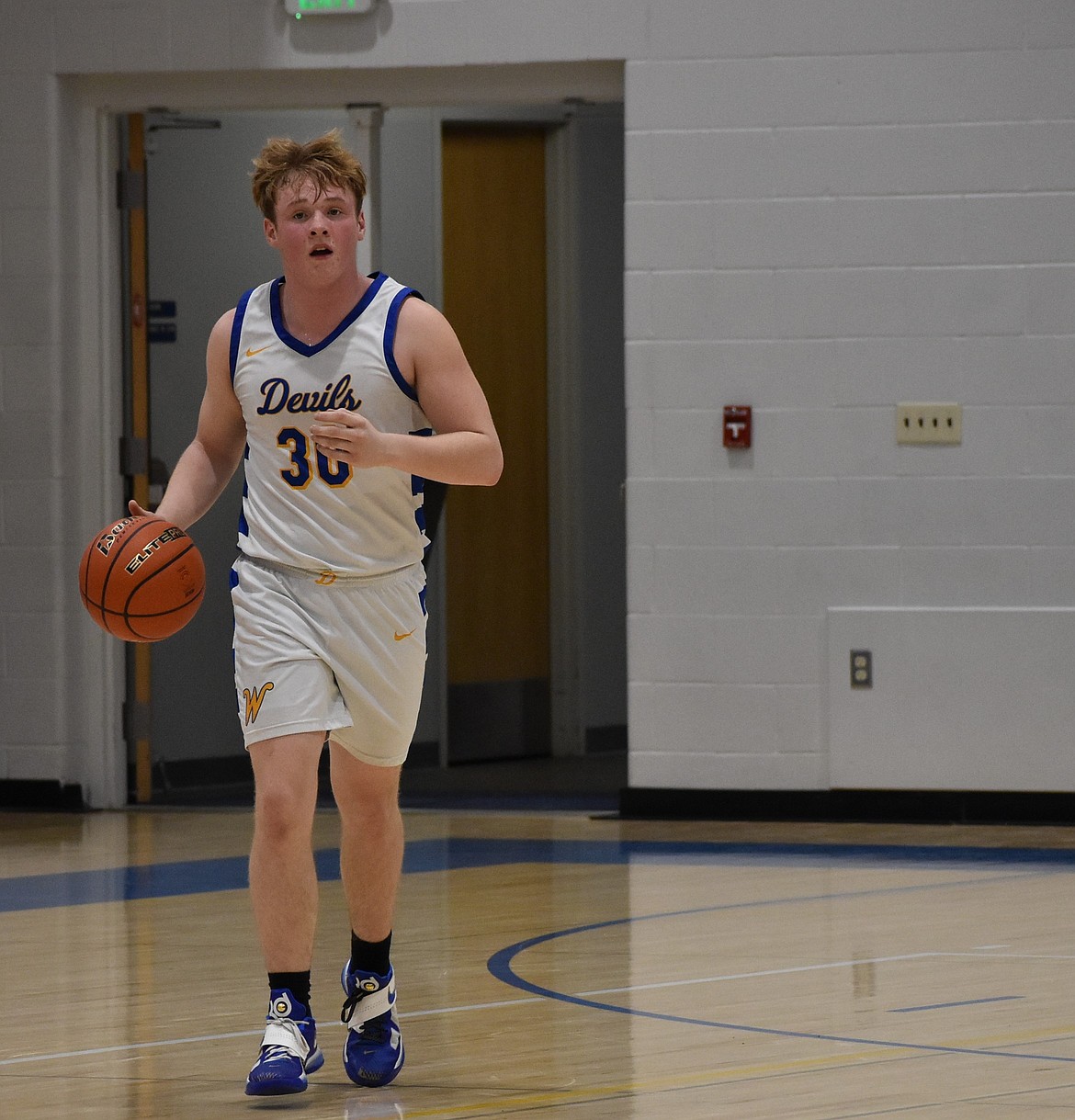 Devils senior Aiden Valline makes his way down the court after gaining possession of the ball in a previous home matchup.