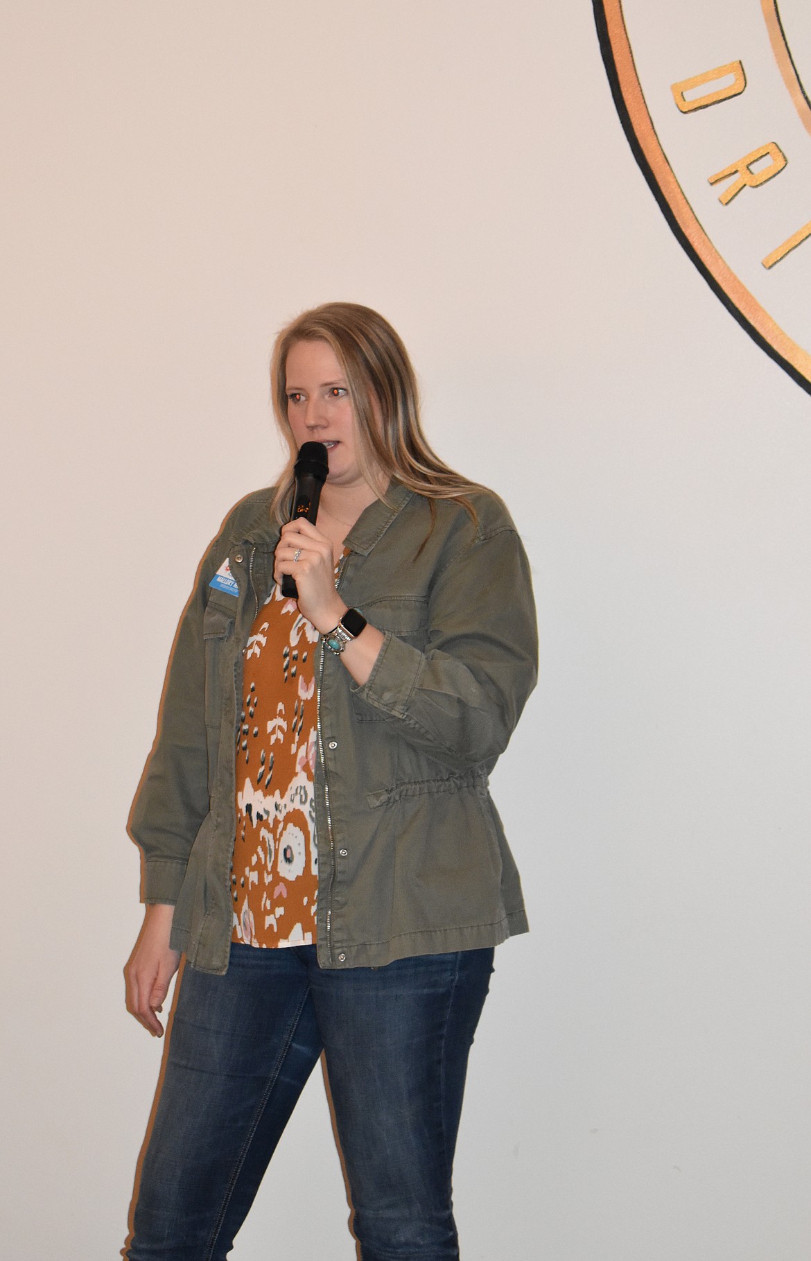 Downtown Moses Lake Association Executive Director Mallory Miller discusses the association’s work on behalf of downtown businesses at the DMLA’s kickoff meeting Thursday at Moore Brewing Company.