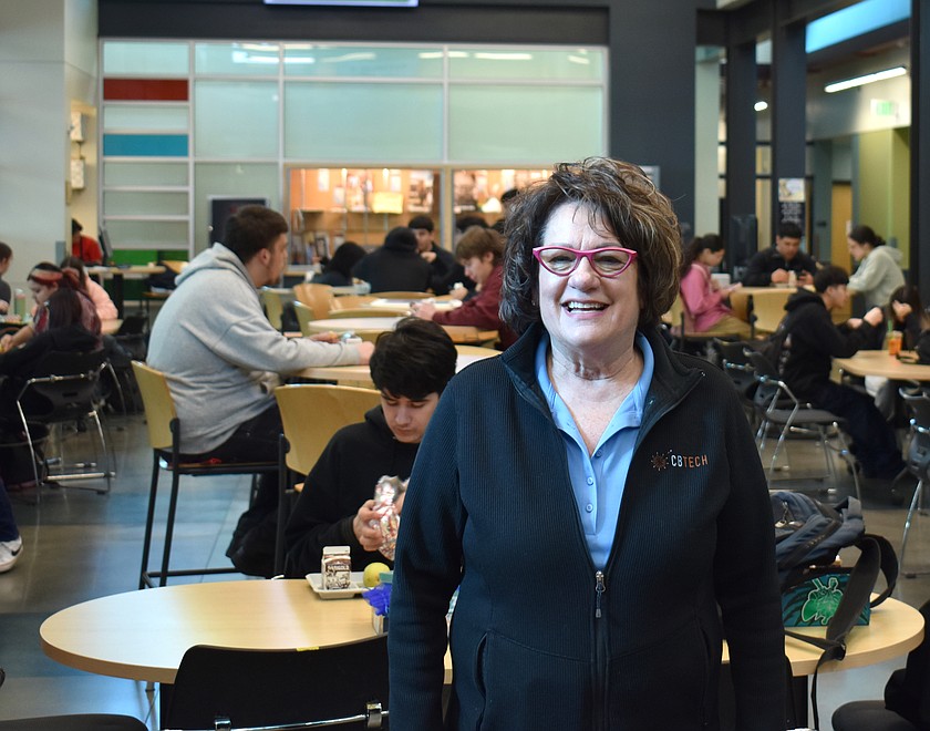 Columbia Basin Technical Skills Center Director Christine Armstrong stands in the common area of the school she helped build. Armstrong will retire this summer after 40 years with the Moses Lake School District.