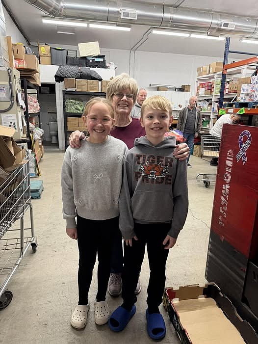 Tyler Wilson, left, and Silas Stredwick, fourth graders at Columbia Ridge Elementary, visited the Ephrata Food Bank Thursday to present a $471 donation on behalf of their school. The funds were raised by the Columbia Ridge Associated Student Body through their “Caps for a Cause” and “Stuffies for a Cause” fundraisers. Through these events, students were invited to wear hats - “caps” - or bring a stuffed animal to school in exchange for a $1 donation. Students and staff generously contributed to the effort.